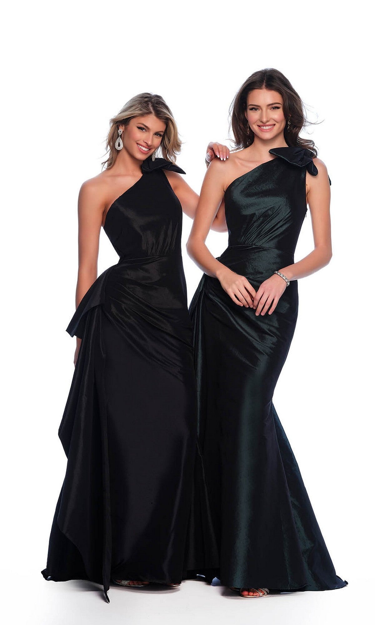 Two women pose together wearing the Long Formal Dress 11598 by Dave and Johnny—sleek, fitted, floor-length one-shoulder evening gowns—against a plain white background.